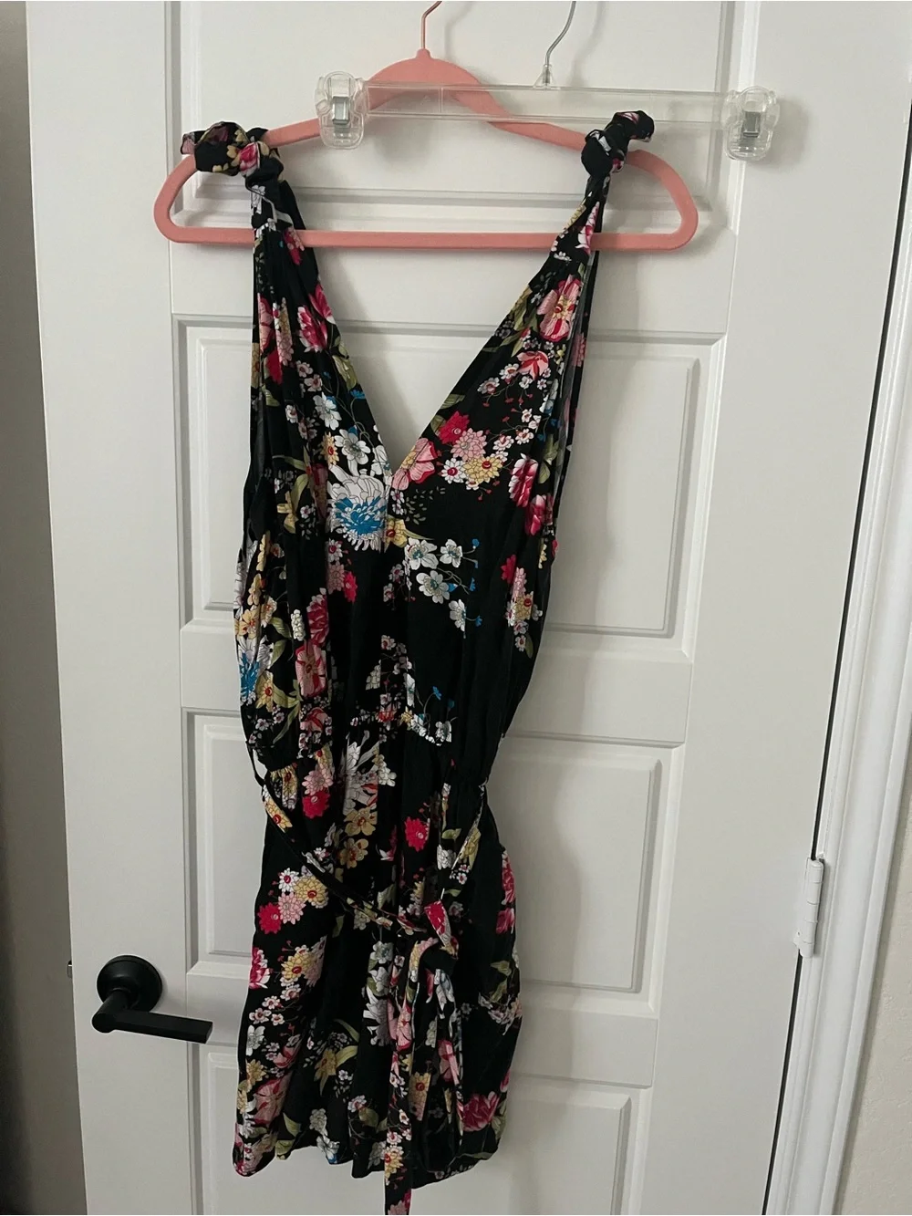 Black floral romper with pink, red, and white flowers - XL